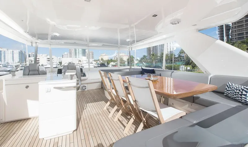 Slide: The Image of Aerial view of a 2015 Princess Flybridge 68 Motor Yacht on water. - 6