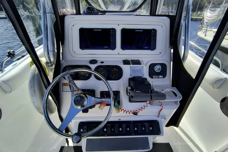 Slide: The Image of Century 2600 Center Console 2003 dashboard with steering wheel and navigation equipment. - 4