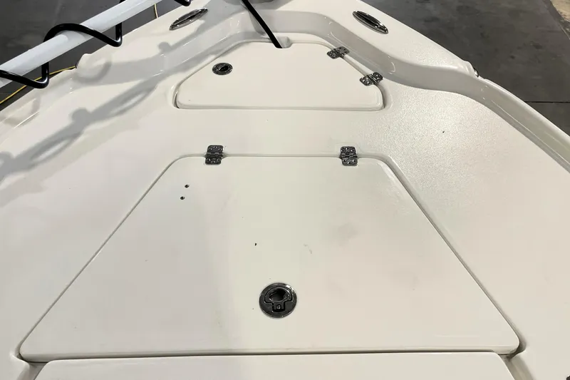 Slide: The Image of 2026 Key West 210 Bay Reef boat deck with storage compartments. - 20