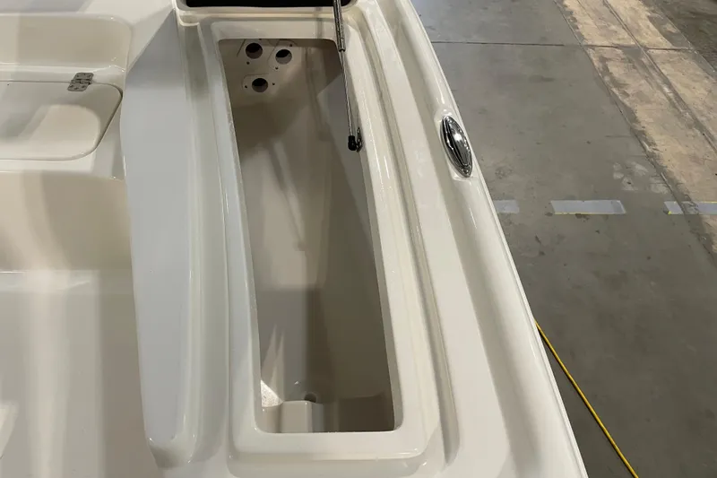 Slide: The Image of 2026 Key West 210 Bay Reef boat interior storage compartment. - 23