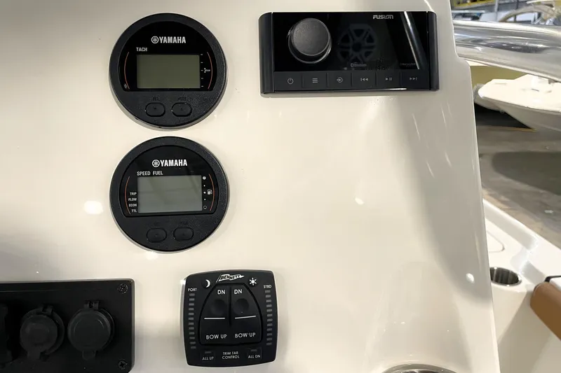 Slide: The Image of Dashboard of 2026 Key West 210 Bay Reef with Yamaha gauges and Fusion audio system. - 35