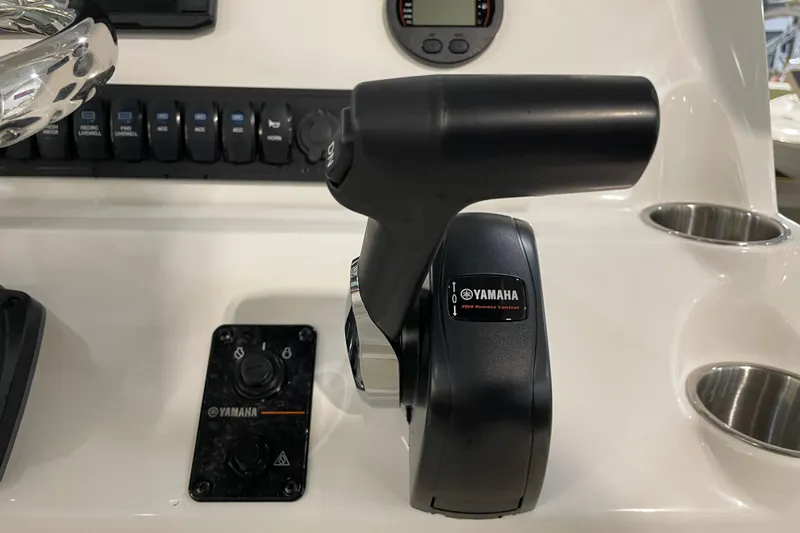Slide: The Image of Yamaha throttle control on 2026 Key West 210 Bay Reef boat dashboard. - 36