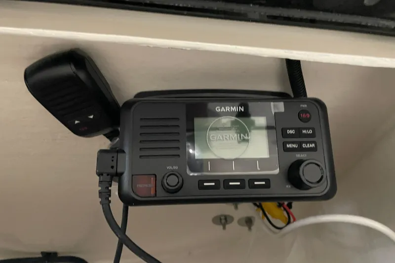 Slide: The Image of Garmin marine radio installed on 2026 Key West 210 Bay Reef boat. - 38