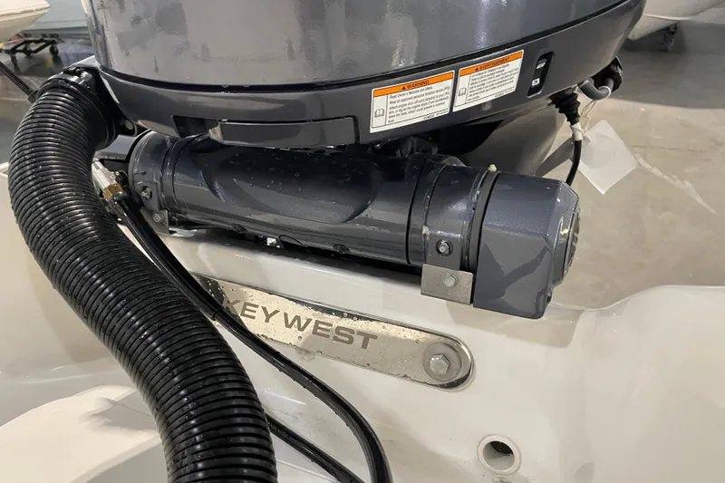Slide: The Image of Close-up of a 2026 Key West 210 Bay Reef boat engine component. - 42