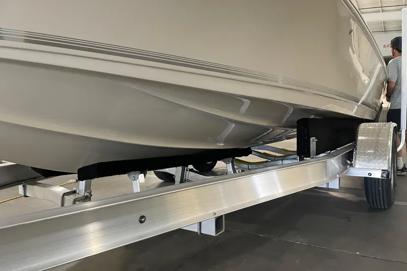 Slide: The Image of 2026 Key West 210 Bay Reef boat on trailer in a garage setting. - 46