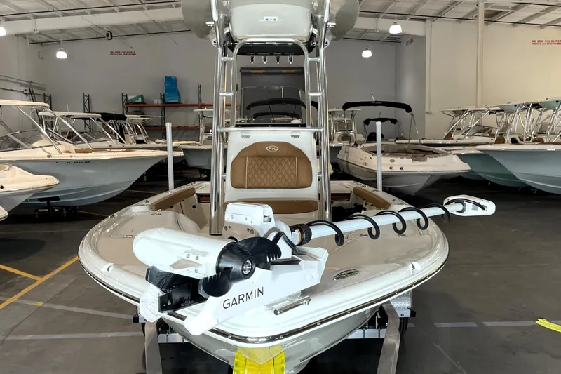 Slide: The Image of 2026 Key West 210 Bay Reef boat in showroom with Garmin equipment. - 6