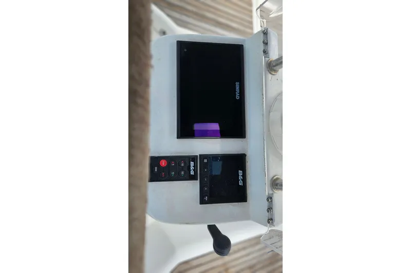 Slide: The Image of Control panel of 2003 Beneteau Oceanis Clipper 393 with navigation equipment. - 2