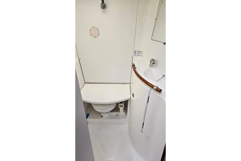 Slide: The Image of Bathroom interior of 2003 Beneteau Oceanis Clipper 393 yacht, featuring compact design. - 20