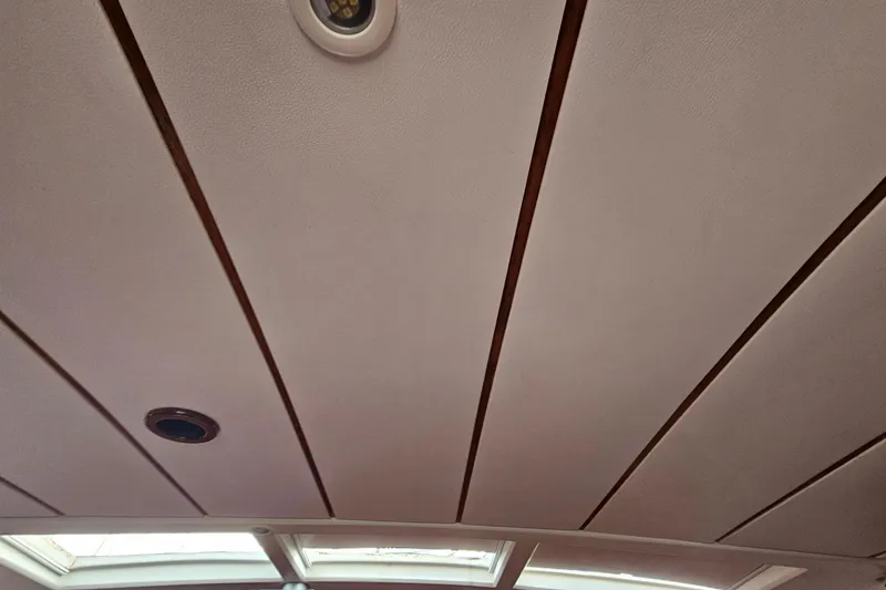 Slide: The Image of Ceiling interior of 2003 Beneteau Oceanis Clipper 393 yacht with recessed lighting. - 24
