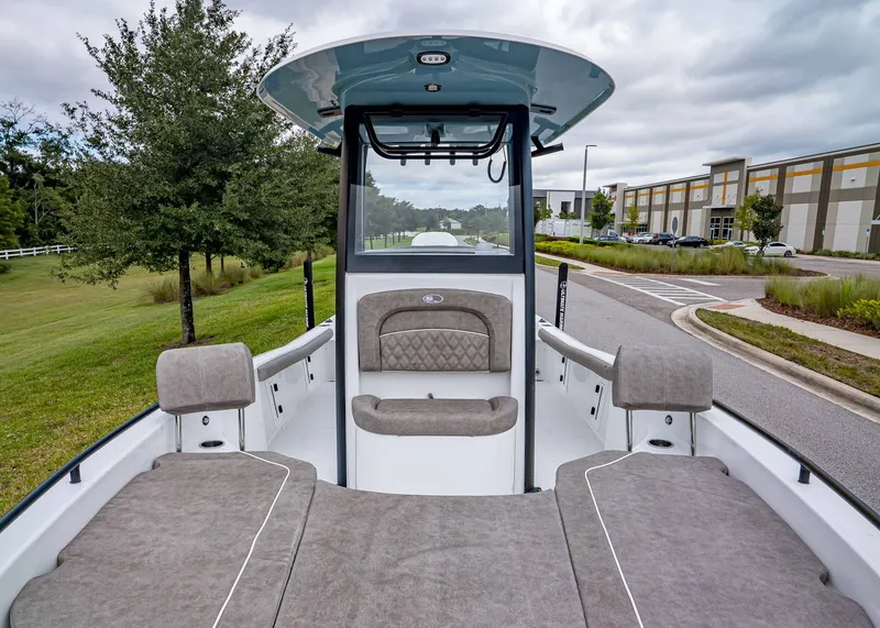 Slide: The Image of 2026 Sea Hunt BX 25 FS boat interior with cushioned seating and modern design. - 18