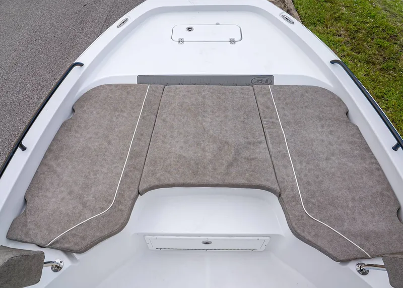 Slide: The Image of 2026 Sea Hunt BX 25 FS boat with cushioned bow seating area. - 23