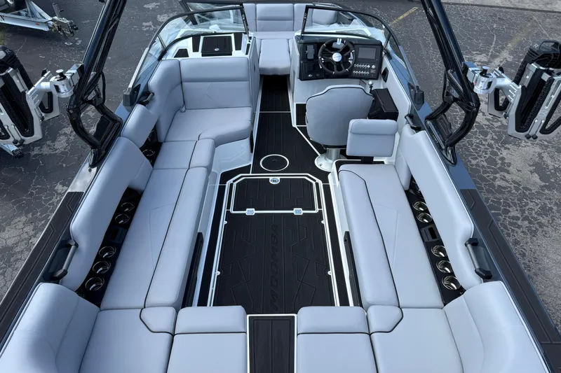 Slide: The Image of 2026 Moomba Tykon boat interior with sleek seating and modern dashboard design. - 15