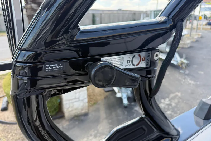 Slide: The Image of Close-up of 2026 Moomba Tykon boat's Roswell patented locking mechanism. - 27