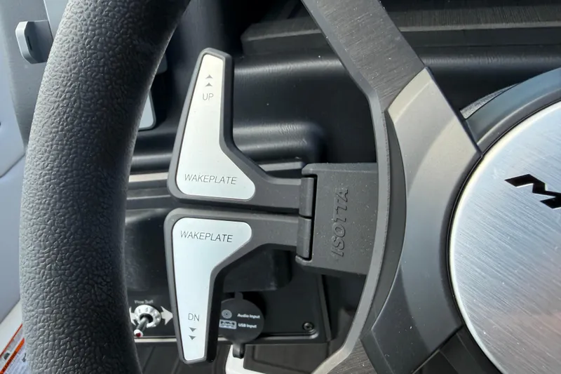 Slide: The Image of Steering wheel of 2026 Moomba Tykon with wakeplate controls. - 34