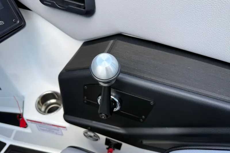 Slide: The Image of 2026 Moomba Tykon boat throttle control with sleek design and modern features. - 36