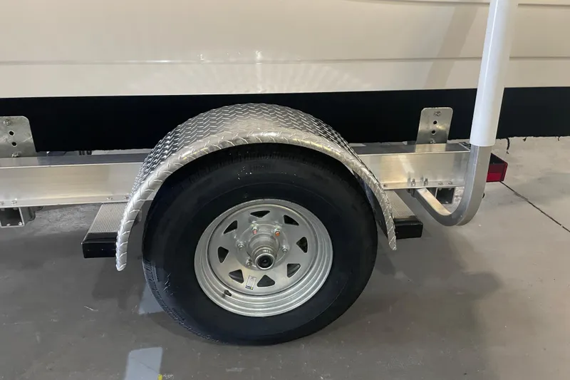 Slide: The Image of 2023 Hurricane SunDeck Sport 201 OB trailer wheel with diamond plate fender. - 32