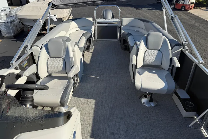 Slide: The Image of 2025 Avalon 2585 LSZ QL pontoon boat interior with luxurious seating and modern design. - 2