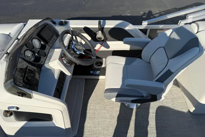 Slide: The Image of 2025 Avalon 2585 LSZ QL boat cockpit with modern steering and comfortable seating. - 7