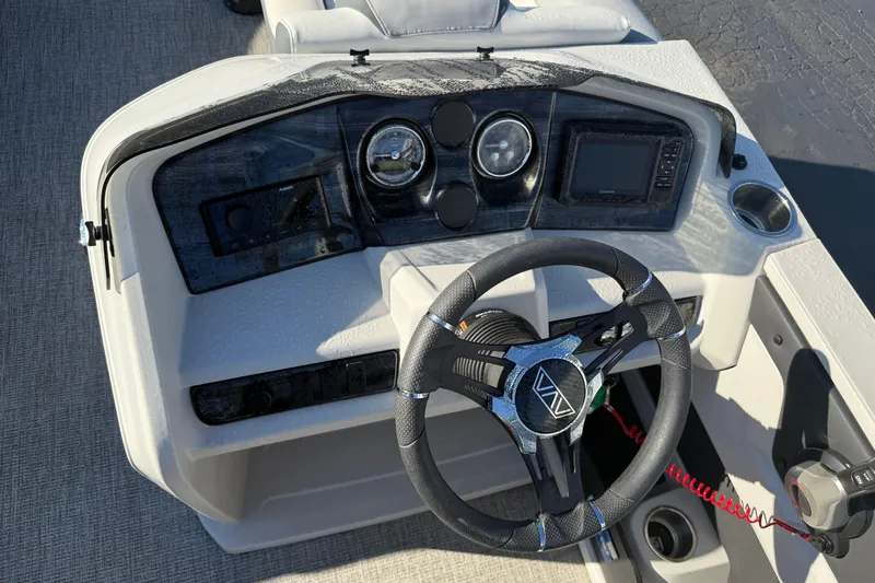 Slide: The Image of Steering console of 2025 Avalon 2585 LSZ QL boat with modern controls and dashboard. - 8