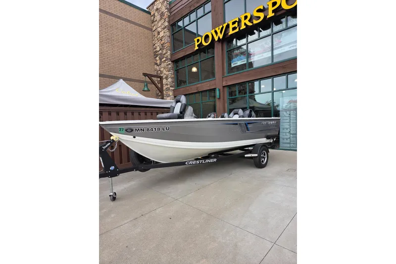 The Image of 2018 Crestliner 1650 Fish Hawk SC boat displayed outside Powersports store. - 1