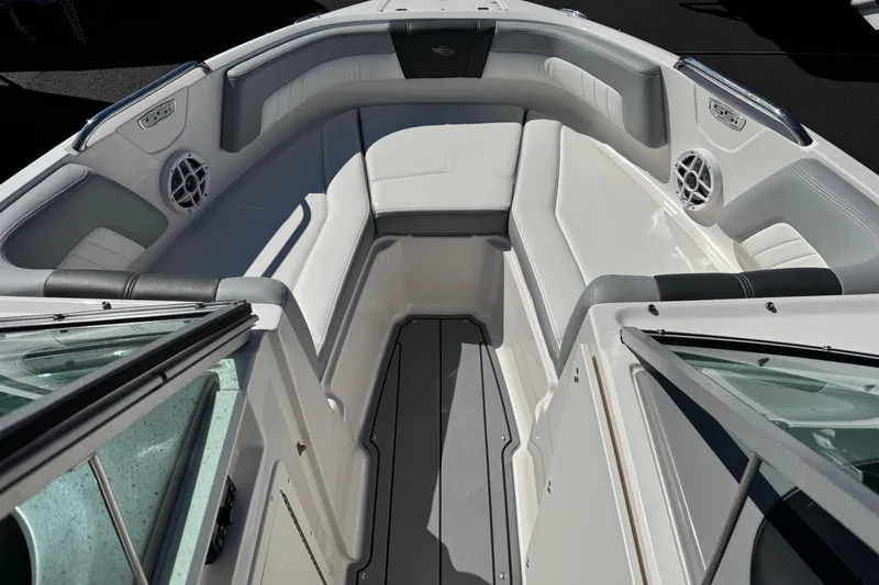 Slide: The Image of 2023 Chaparral 21 SSi OB boat interior with spacious seating and modern design. - 2