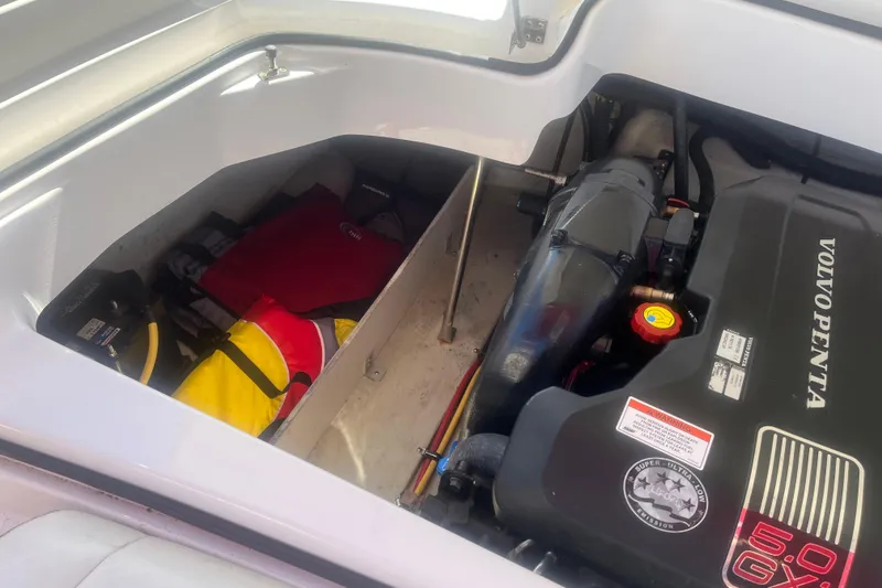 Slide: The Image of Engine compartment of a 2011 Cobalt 210 boat with Volvo Penta 5.0 GXI engine. - 4