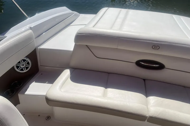 Slide: The Image of Interior of a 2011 Cobalt 210 boat with white leather seating. - 5