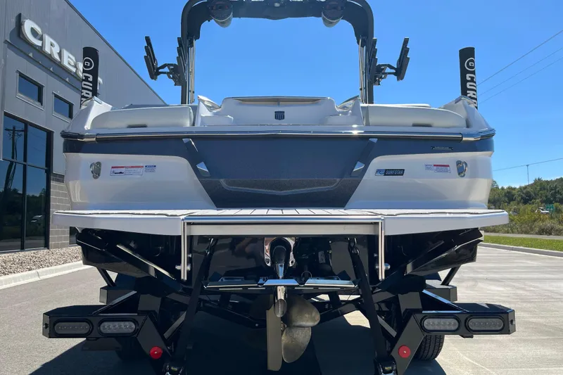 Slide: The Image of 2025 MasterCraft X22 boat rear view, showcasing sleek design and advanced features. - 8