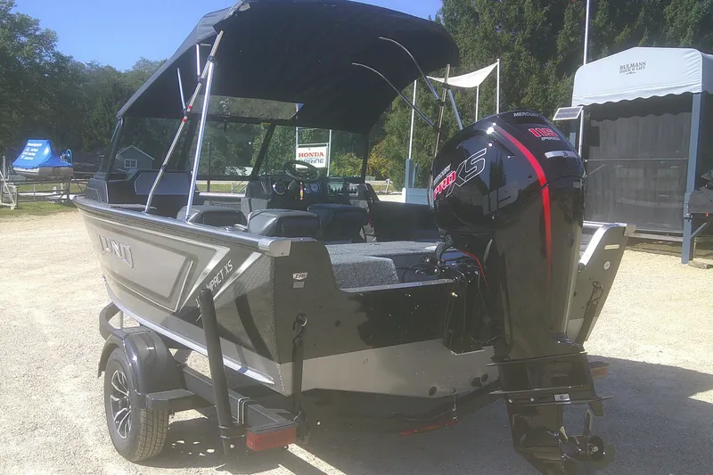 Slide: The Image of 2026 Lund 1775 Impact XS Sport boat with Mercury Pro XS engine on trailer. - 3