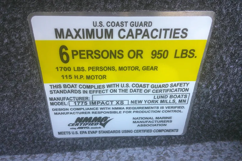 Slide: The Image of U.S. Coast Guard capacity label for 2026 Lund 1775 Impact XS Sport boat, 6 persons or 950 lbs. - 9