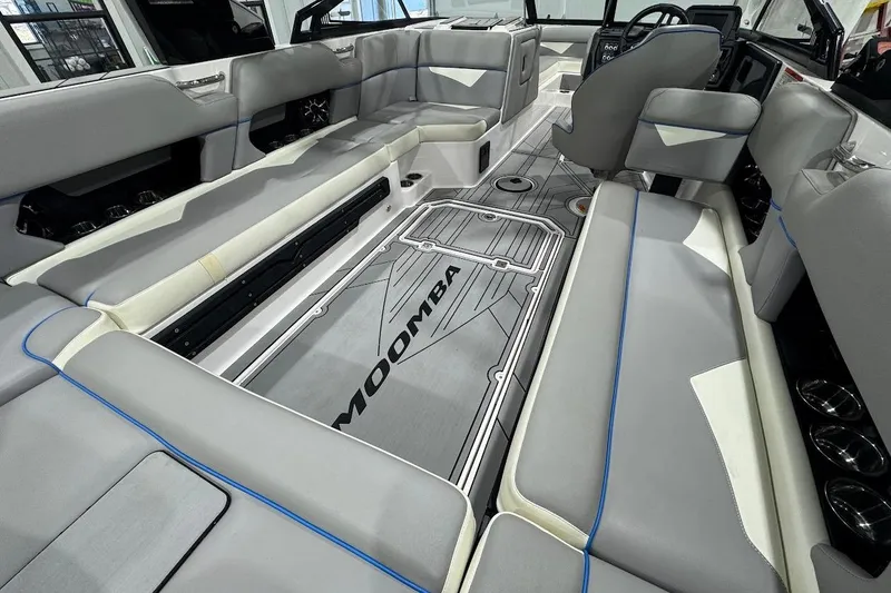 Slide: The Image of 2020 Moomba Makai boat interior with spacious seating and modern design. - 10