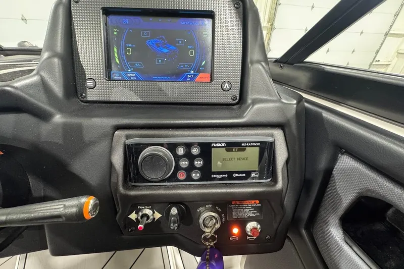 Slide: The Image of 2020 Moomba Makai dashboard with touchscreen and control panel. - 15