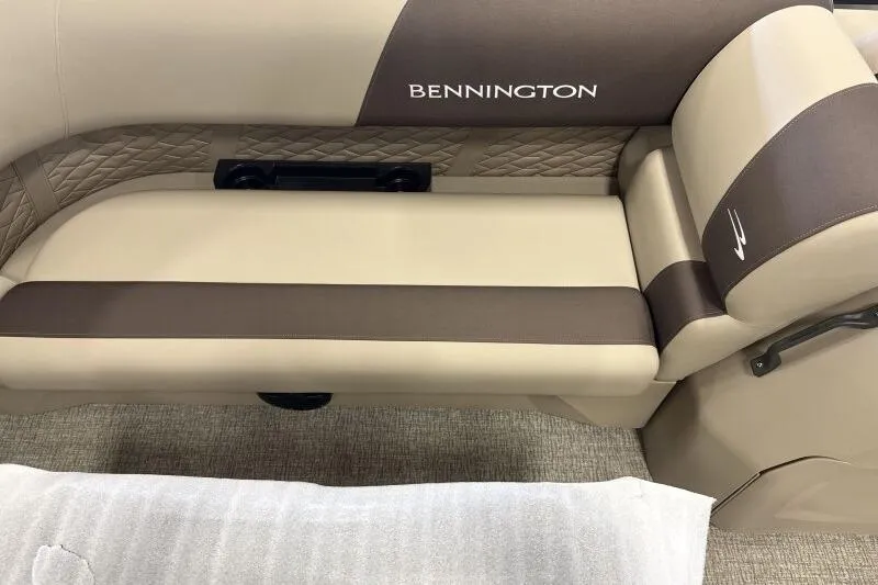 Slide: The Image of 2026 Bennington 22 SSRSE boat seating with beige and brown upholstery. - 18