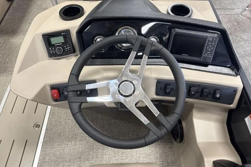 Slide: The Image of Steering console of 2026 Bennington 22 SSRSE boat with modern controls and navigation system. - 21