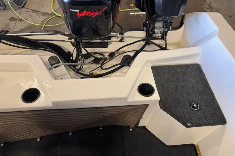 Slide: The Image of 1998 Skeeter WX1850 boat interior with Yamaha VMAX engine, showing wiring and compartments. - 12