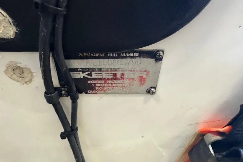 Slide: The Image of 1998 Skeeter WX1850 hull identification plate with visible serial number. - 5