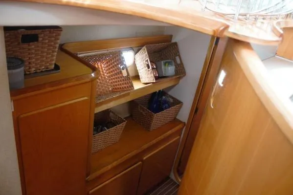 Slide: The Image of Interior storage area of 2006 Alliaura Marine Privilege 435 EZC with wicker baskets. - 12