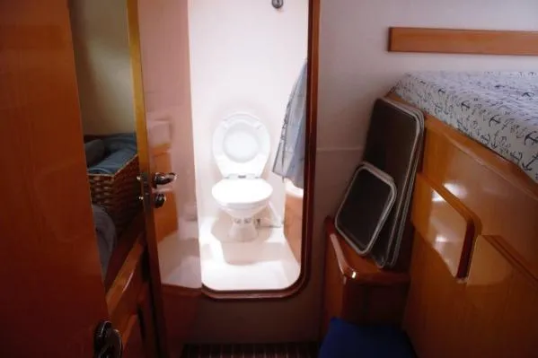 Slide: The Image of 2006 Alliaura Marine Privilege 435 EZC yacht interior with bathroom and cozy cabin. - 30