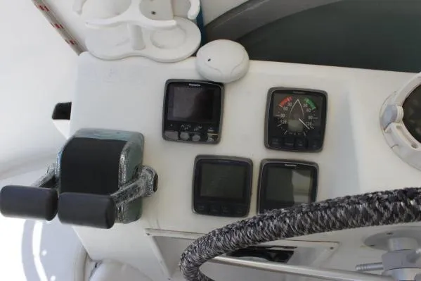 Slide: The Image of Control panel of 2006 Alliaura Marine Privilege 435 EZC catamaran with navigation instruments. - 34
