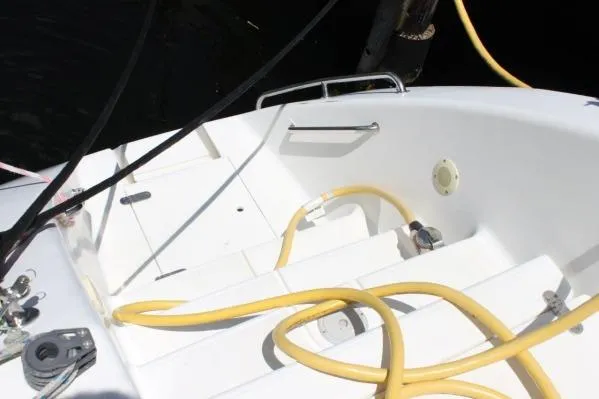 Slide: The Image of 2006 Alliaura Marine Privilege 435 EZC yacht deck with yellow hose and fittings. - 55