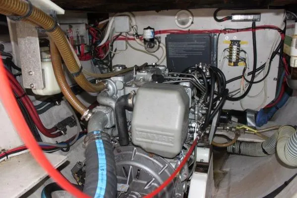 Slide: The Image of Engine room of 2006 Alliaura Marine Privilege 435 EZC with visible wiring and components. - 68