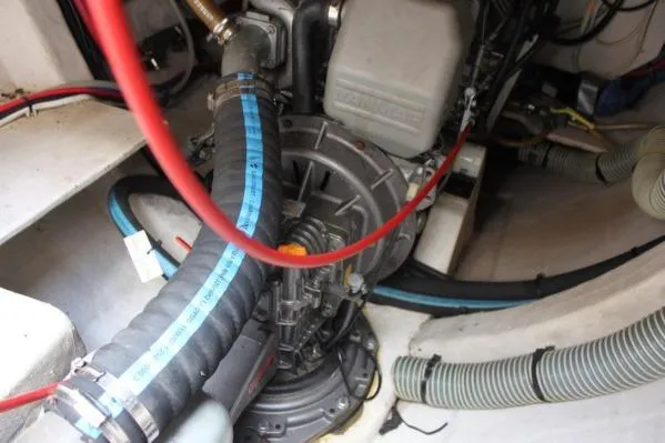 Slide: The Image of Engine compartment of 2006 Alliaura Marine Privilege 435 EZC with visible hoses and components. - 70