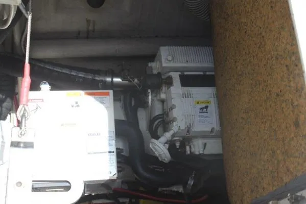 Slide: The Image of Engine compartment of 2006 Alliaura Marine Privilege 435 EZC catamaran, showcasing mechanical components. - 73