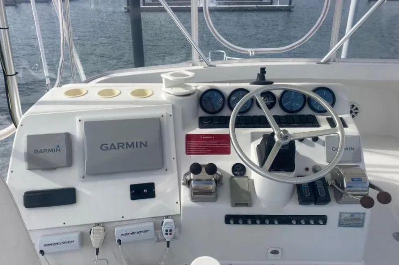 Slide: The Image of Helm of 2000 Luhrs Tournament 360 Convertible with Garmin navigation system. - 25