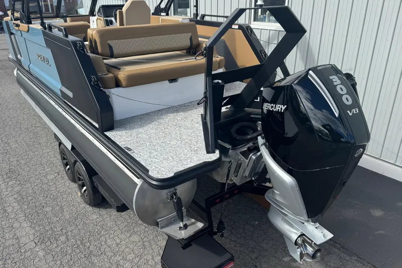 Slide: The Image of 2026 Revel RS25 boat with Mercury 300 V8 engine, featuring spacious seating and modern design. - 13