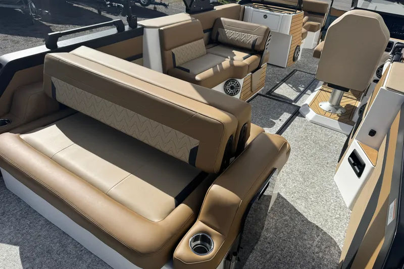 Slide: The Image of Luxurious interior of 2026 Revel RS25 boat with tan leather seating and modern design. - 30