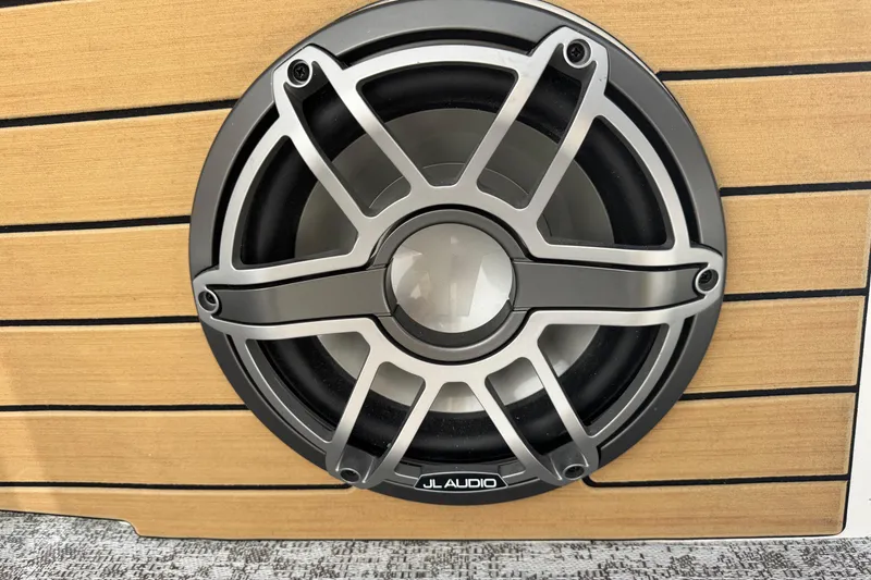 Slide: The Image of Speaker on wooden panel, Revel RS25, 2026 model, featuring JL Audio design. - 33