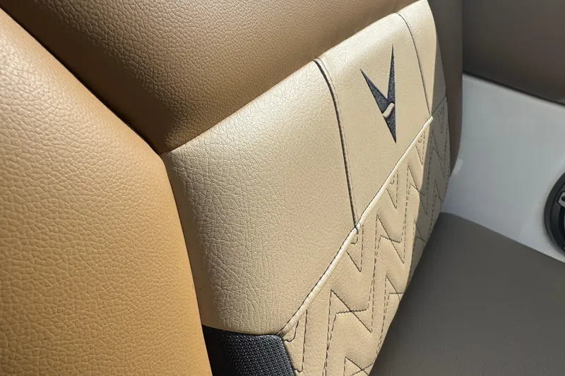 Slide: The Image of 2026 Revel RS25 interior seat detail with beige leather and unique stitching design. - 35