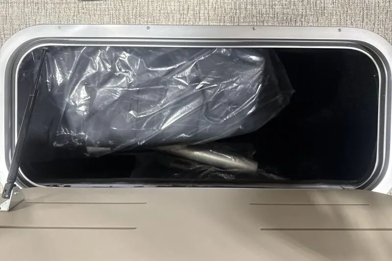 Slide: The Image of Storage compartment of 2026 Bennington 22 MSBSF boat, featuring interior view. - 13