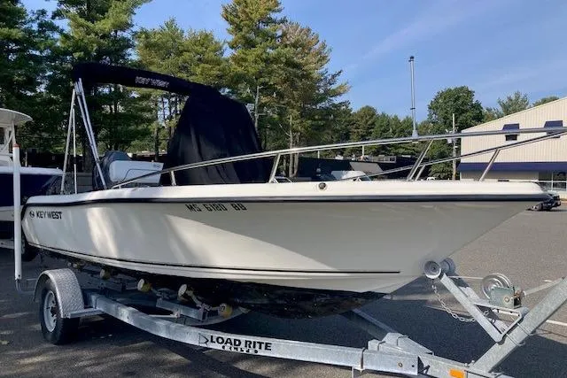 Slide: The Image of 2013 Key West 189 FS boat on trailer in parking lot. - 13